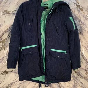 navy blue and teal color jacket.